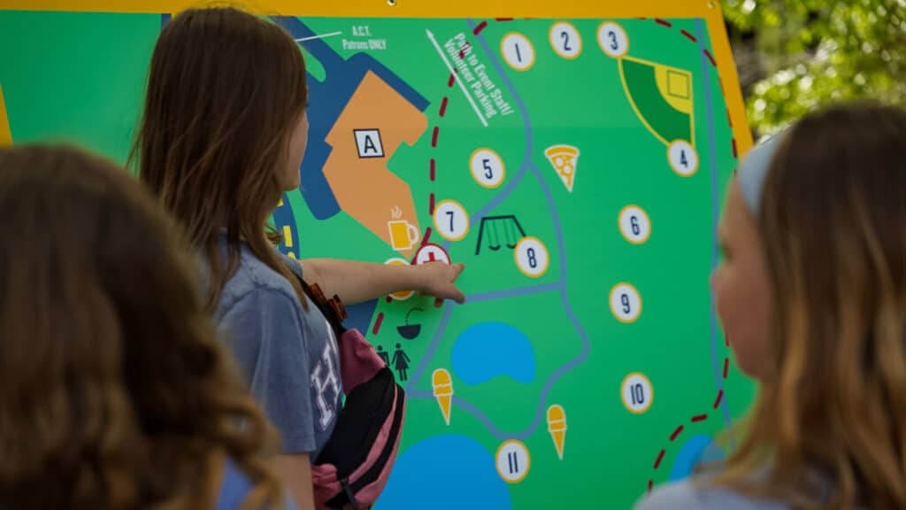 A group of patrollers checks the map to plan out their next move.